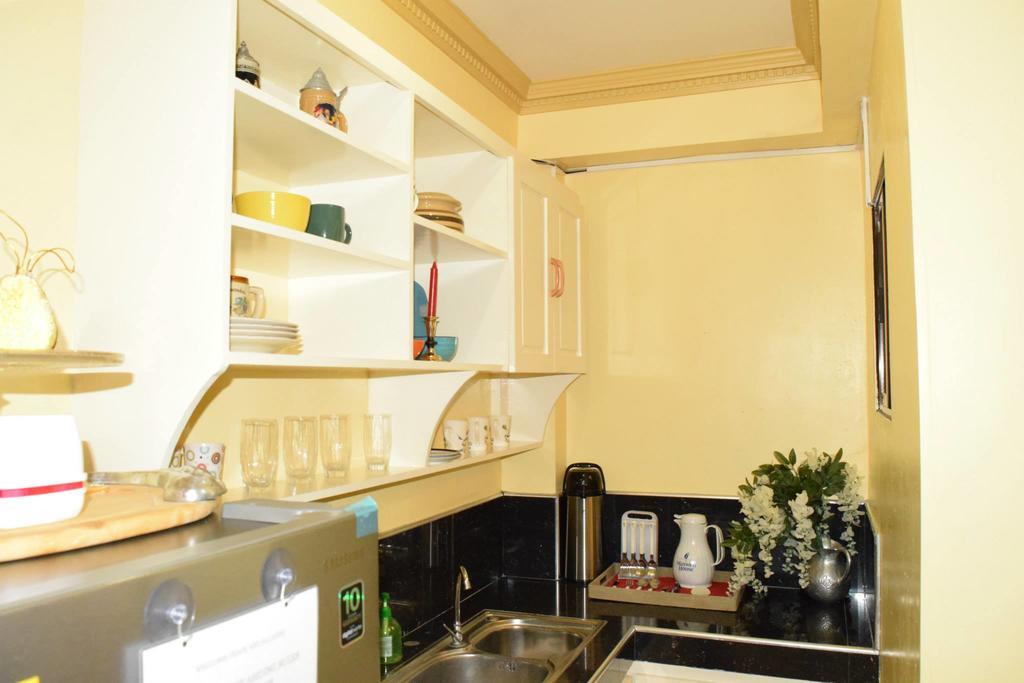 The Saint Joseph Residential Suites Lucena Quarto foto